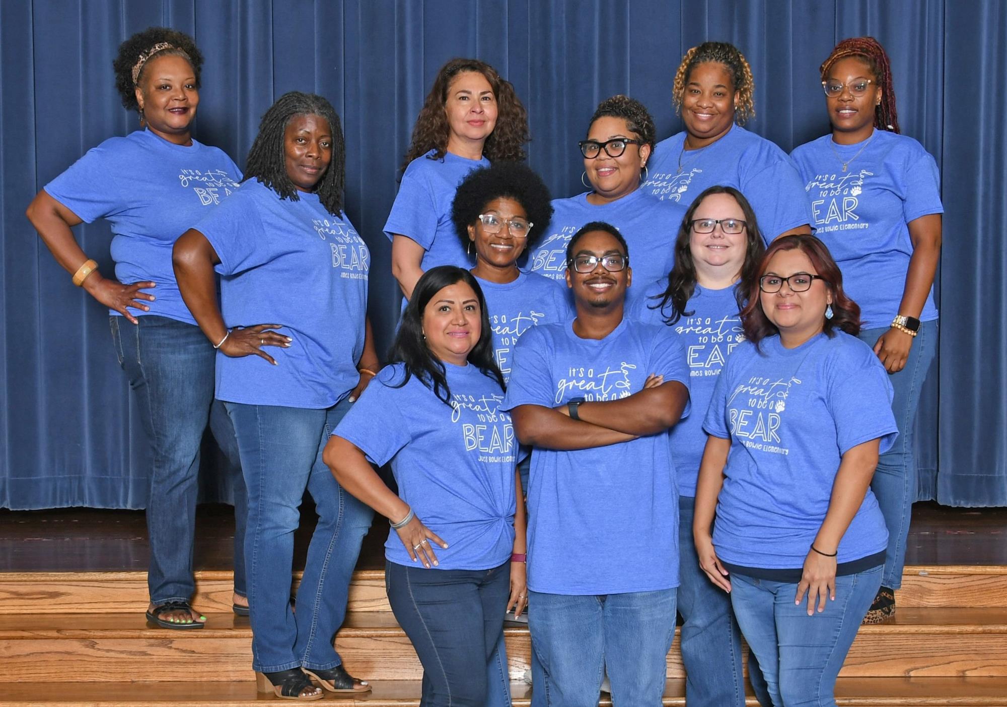 Special education staff smiling for staff picture